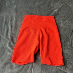Five the label neon orange biker shorts